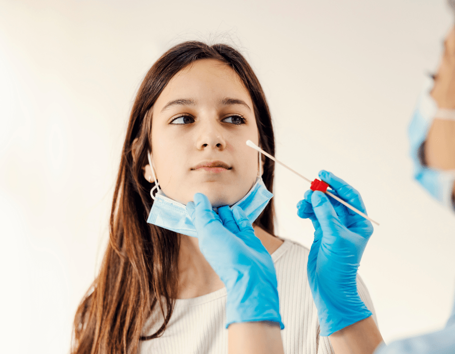 child getting a covid test